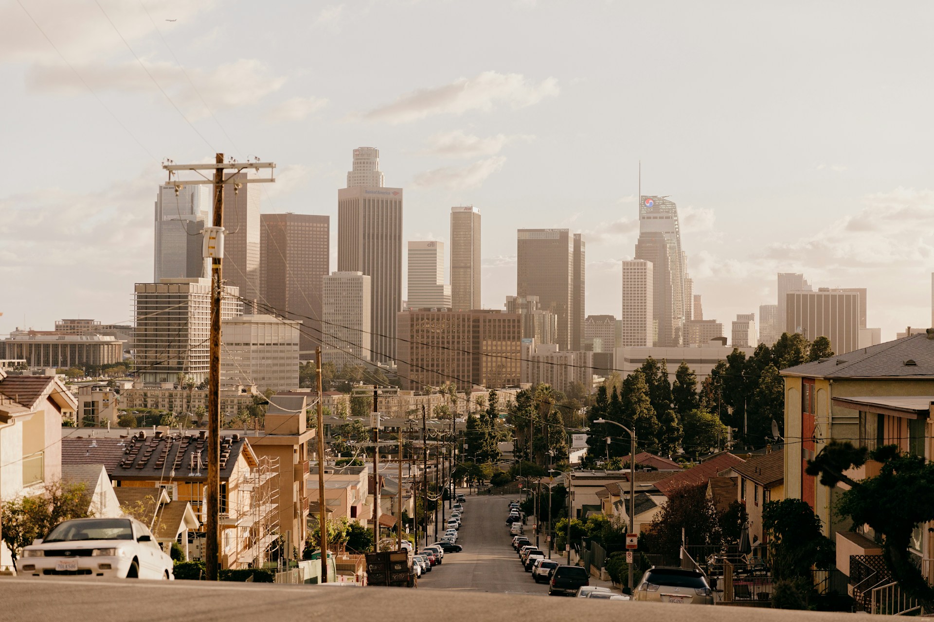 Cars parked on a street leading towards downtown LA